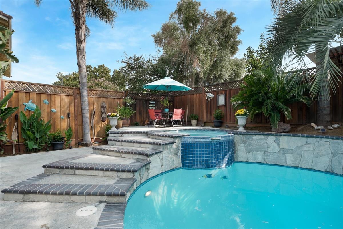 1428 Eagles Nest Lane Gilroy, CA 95020 - Photo 36 of 38 a view of a patio with chairs and plants