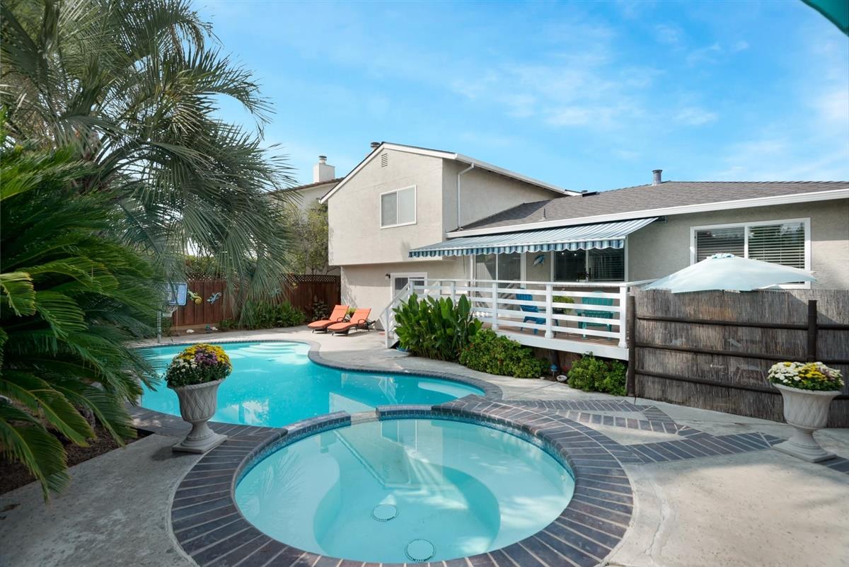 1428 Eagles Nest Lane Gilroy, CA 95020 - Photo 38 of 38 a view of a house with backyard sitting area and swimming pool