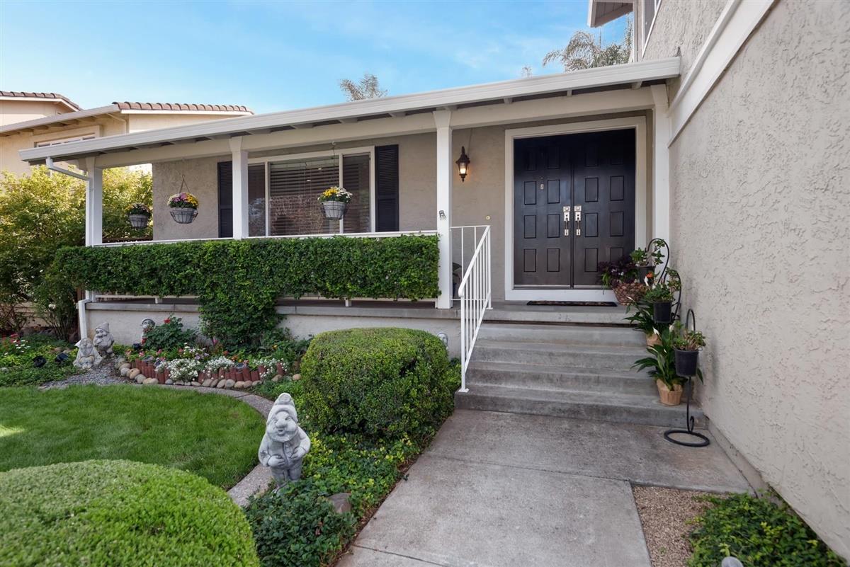 1428 Eagles Nest Lane Gilroy, CA 95020 - Photo 4 of 38 a front view of a house with a yard