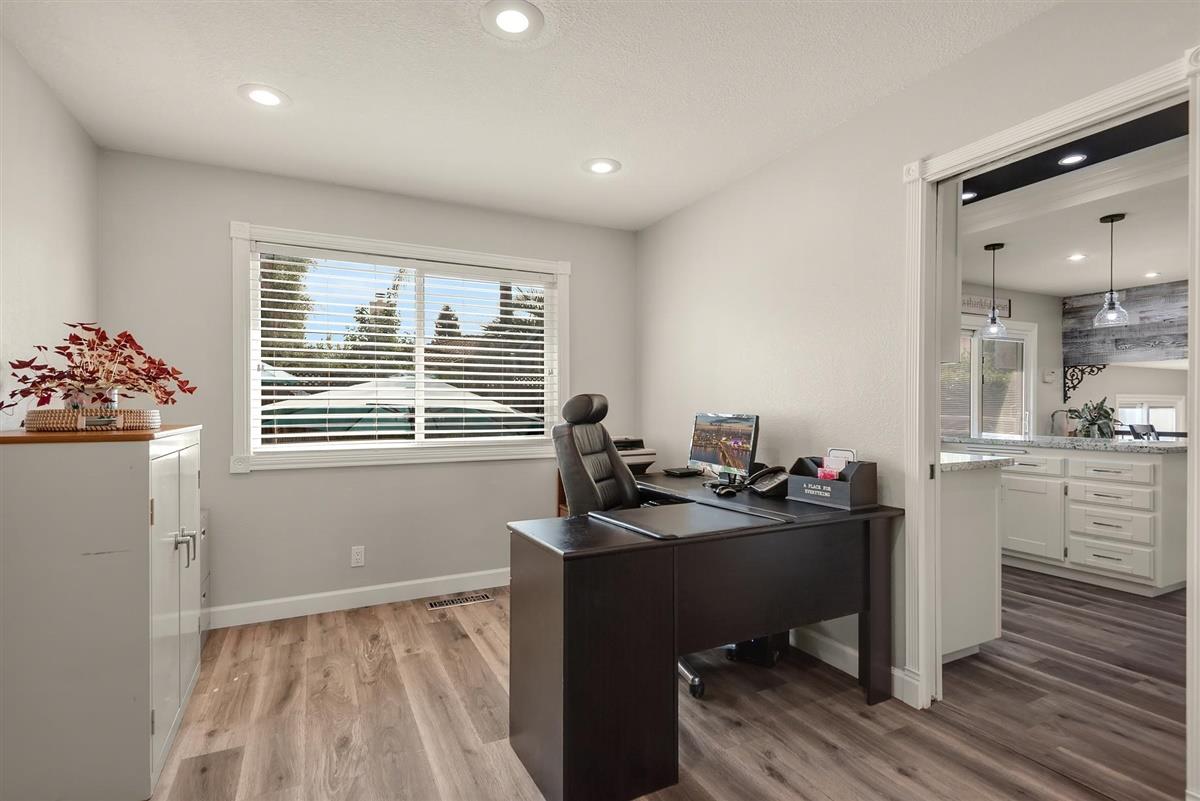 1428 Eagles Nest Lane Gilroy, CA 95020 - Photo 9 of 38 a view of a workspace with furniture and a window