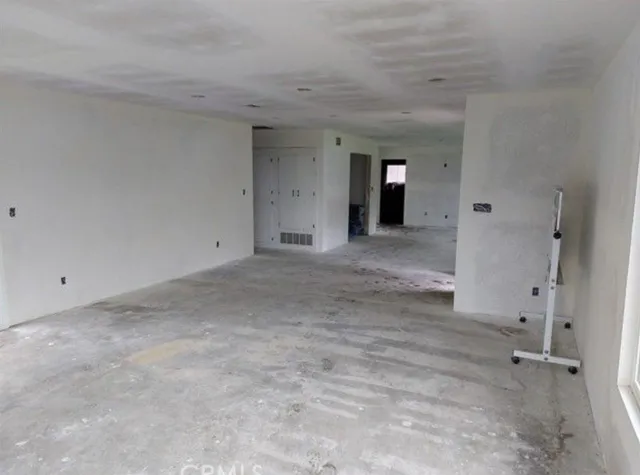 a view of a room with an empty space