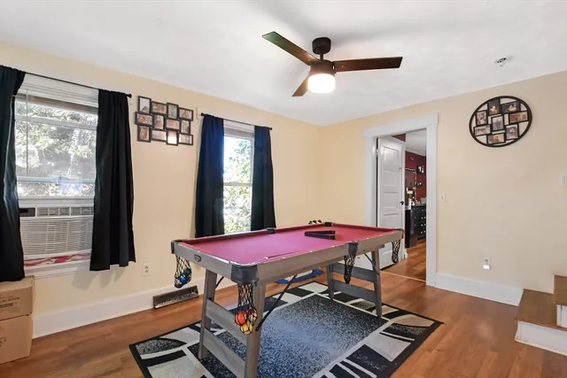 a room with gym equipment and a window