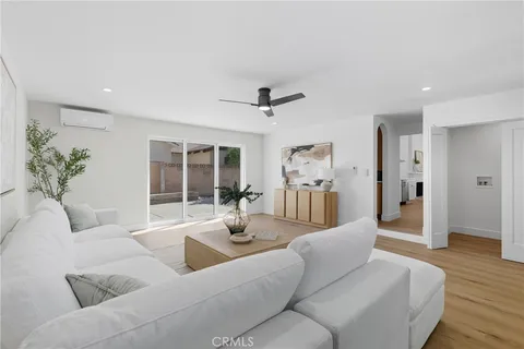 a living room with furniture and window