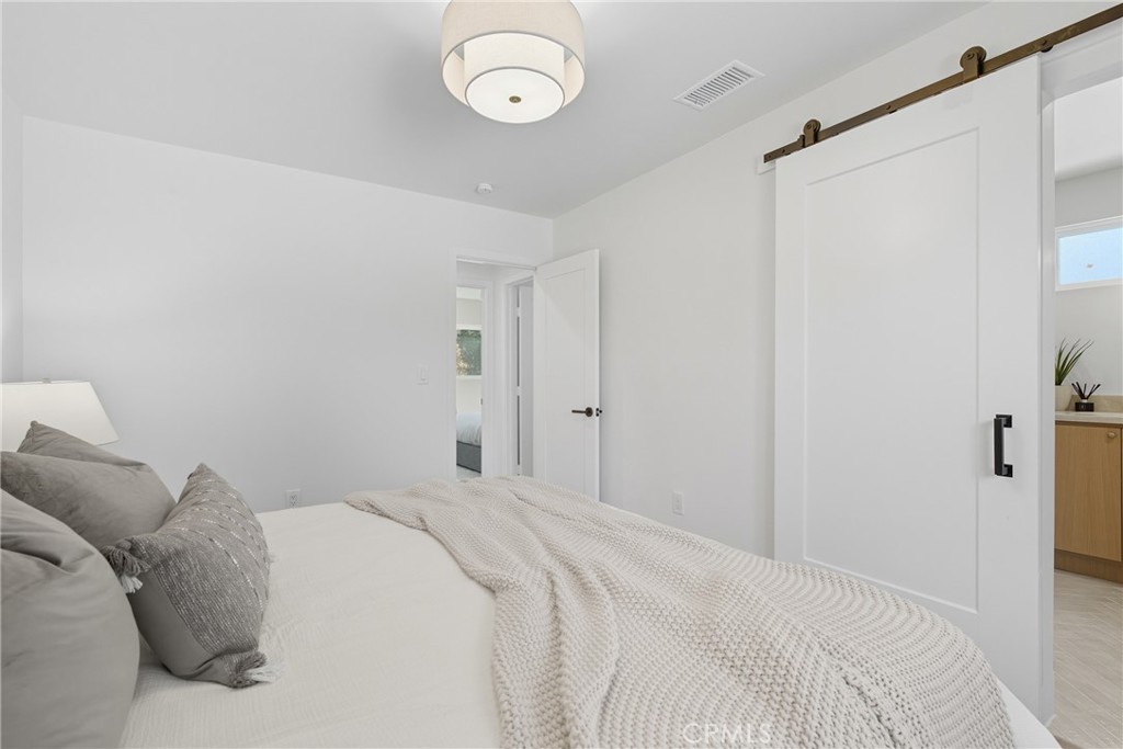 226 Tennyson Street Thousand Oaks, CA 91360 - Photo 19 of 27 a bedroom with a bed and a window