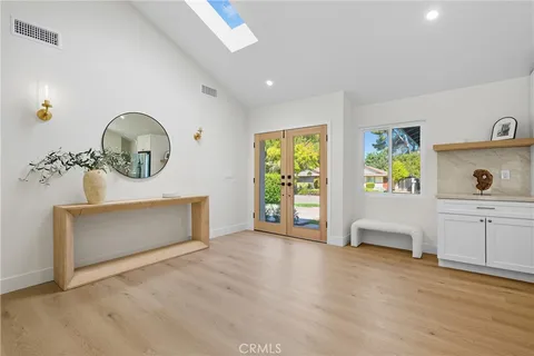 a view of an empty room and window