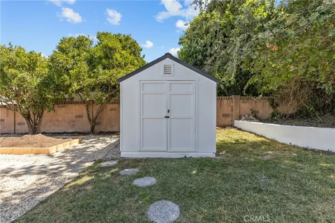 a view of backyard of house