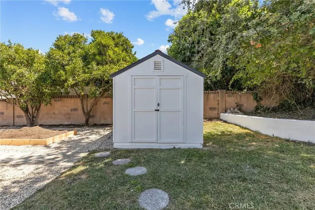 a view of backyard of house