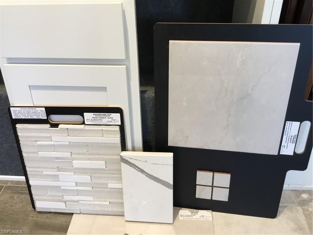 5693 Mayflower Way, Unit 1107 Ave Maria, FL 34142 - Photo 4 of 46 a view of cabinet