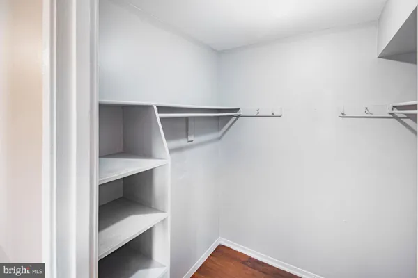 a view of an empty walk in closet