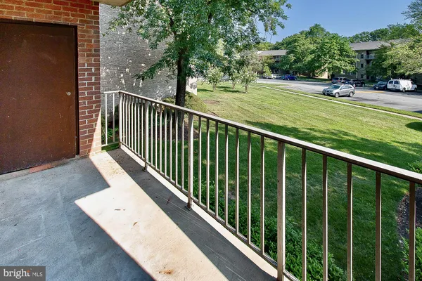 a view of a balcony with a lake
