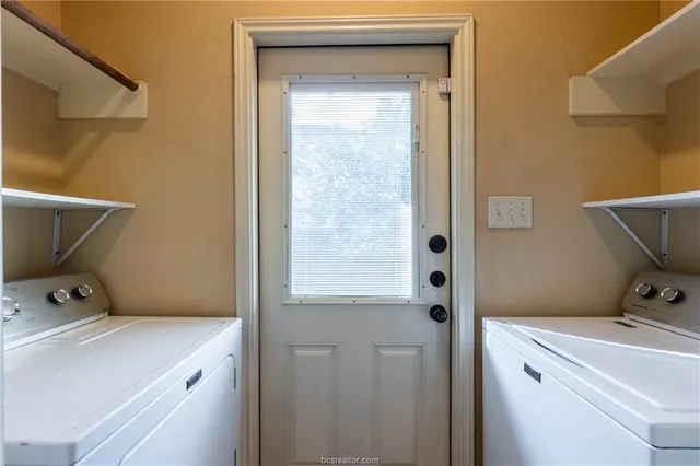 a bathroom with a toilet and a sink