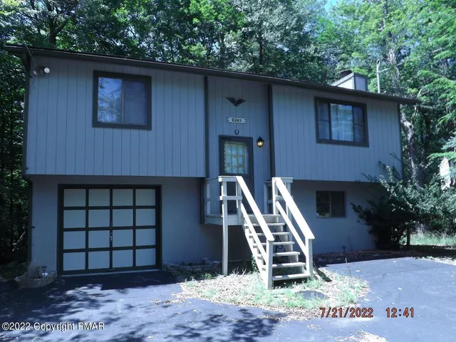 a front view of a house with balcony