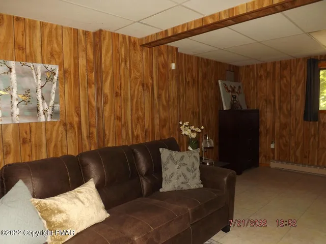 a living room with furniture and a couch