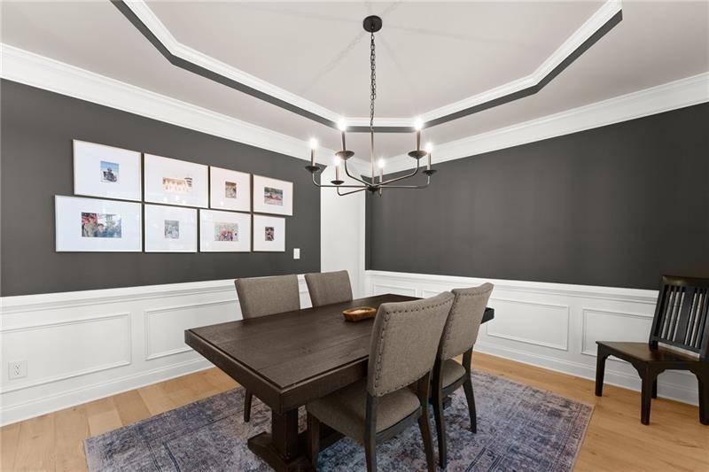8055 Veranda Curve Ball Ground, GA 30107 - Photo 14 of 65 a view of a dining room with a table and chairs