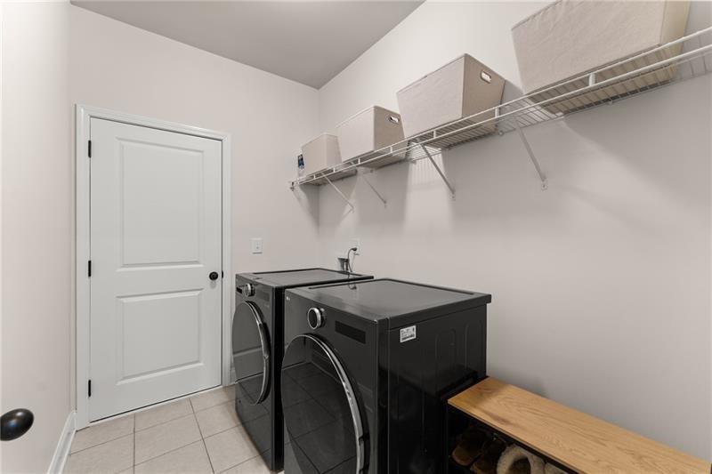 8055 Veranda Curve Ball Ground, GA 30107 - Photo 24 of 65 a utility room with dryer and washer