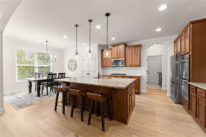 8055 Veranda Curve Ball Ground, GA 30107 - Photo 3 of 65