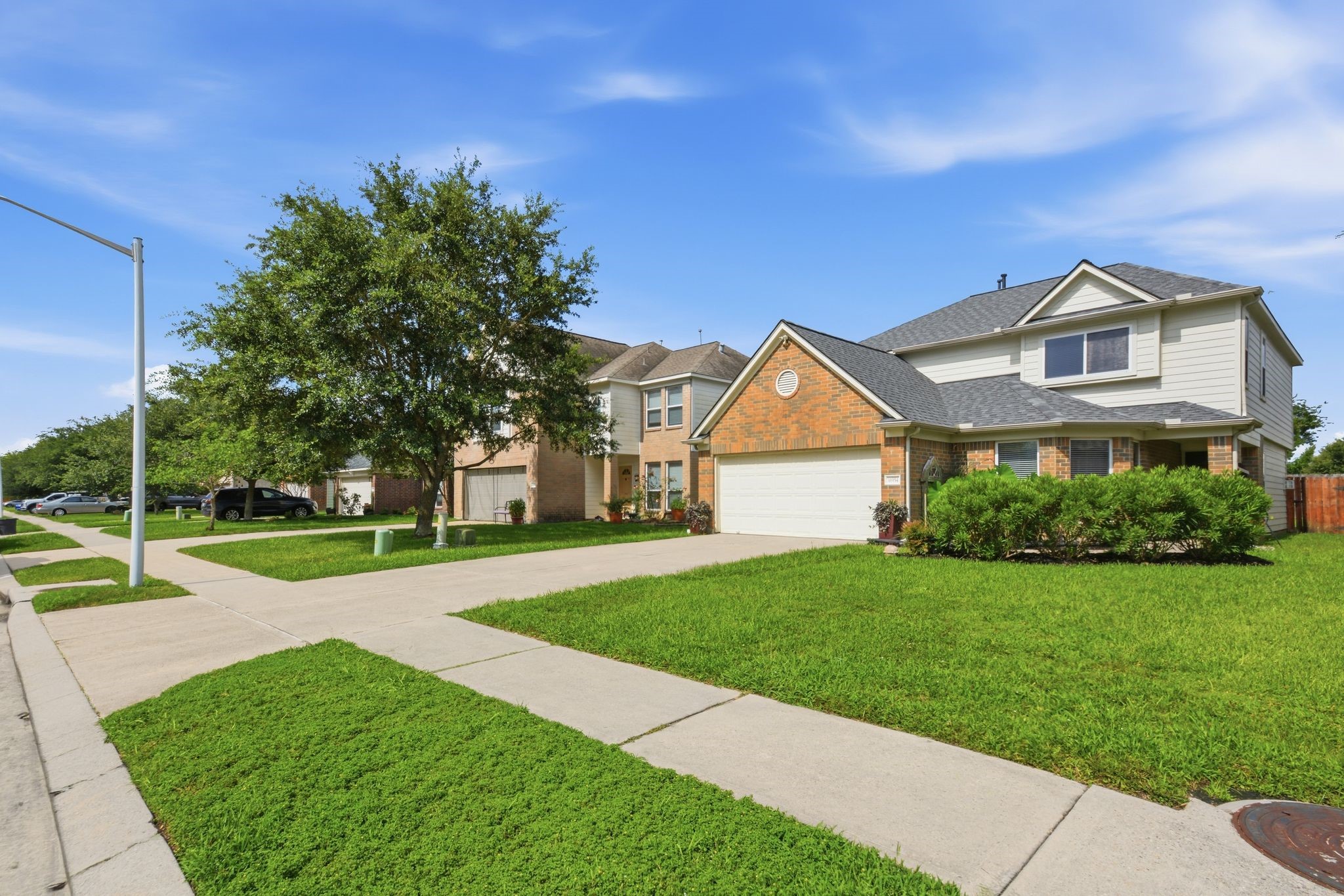 16954 Tableland Trail Conroe, TX 77385 - Photo 3 of 33 Beautiful corner-lot home with great curb appeal, a spacious yard, and a welcoming neighborhood setting.