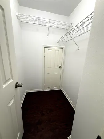 a view of small space with racks on the wall