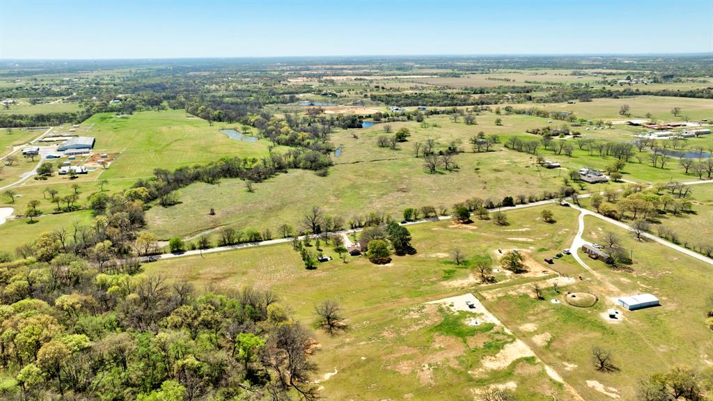 12592 Friendship Road Pilot Point, TX 76258 - Photo 3 of 22 an aerial view of residential houses with outdoor space