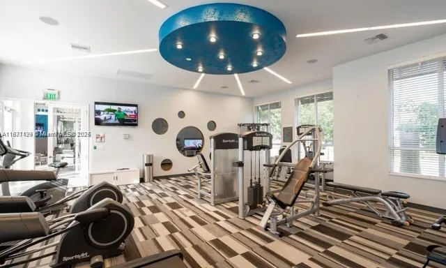 a view of a room with gym equipment