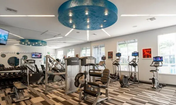 a very nice looking room with gym equipment