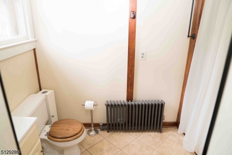 168 East Main Street Lebanon, NJ 08833 - Photo 11 of 33 a bathroom with a toilet and a sink