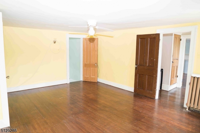 168 East Main Street Lebanon, NJ 08833 - Photo 18 of 33 a view of a hallway with wooden floor