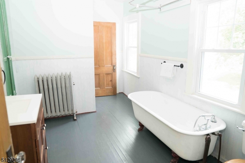 168 East Main Street Lebanon, NJ 08833 - Photo 26 of 33 a bathroom with a sink and a bathtub