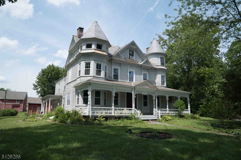 168 East Main Street Lebanon, NJ 08833 - Photo 29 of 33 a front view of a house with a garden