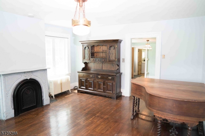 168 East Main Street Lebanon, NJ 08833 - Photo 5 of 33 a living room with furniture and a fireplace