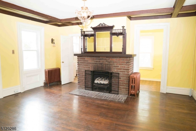 168 East Main Street Lebanon, NJ 08833 - Photo 7 of 33 a living room with a fireplace