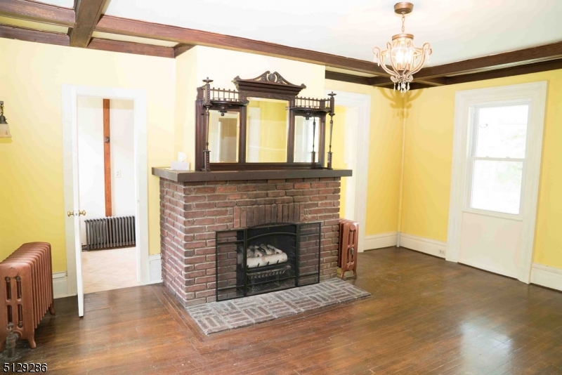 168 East Main Street Lebanon, NJ 08833 - Photo 8 of 33 a living room with furniture and a fireplace