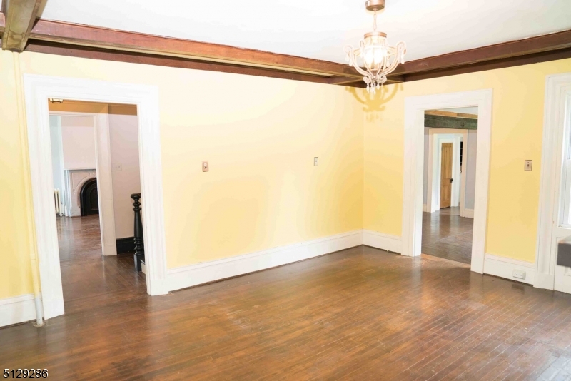 168 East Main Street Lebanon, NJ 08833 - Photo 10 of 33 a view of a big room with wooden floor and windows