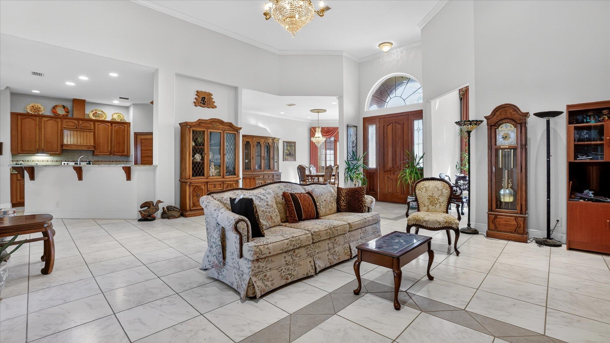 453 Federal Point Road East Palatka, FL 32131 - Photo 11 of 68 a living room with furniture and a large window