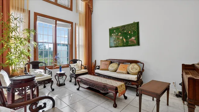 a kitchen with granite countertop white cabinets stainless steel appliances and a sink