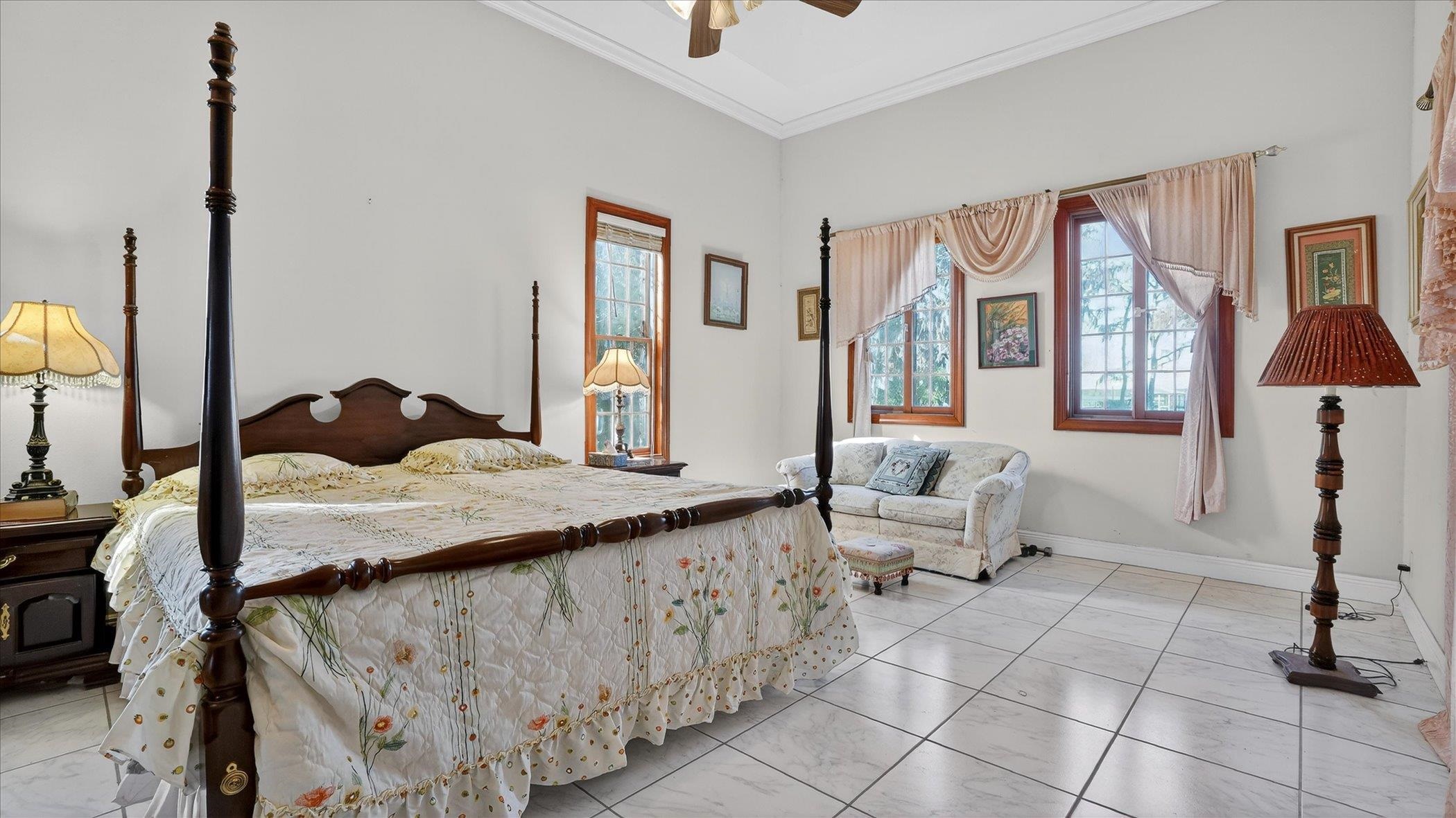 453 Federal Point Road East Palatka, FL 32131 - Photo 27 of 68 a bedroom with furniture and a window