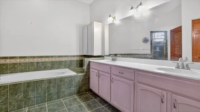 a bedroom with a bed and a cabinets