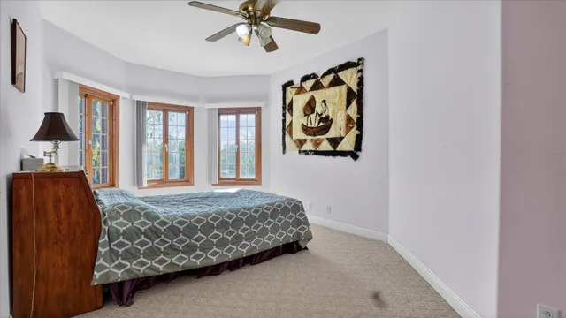 a view of a livingroom with furniture and window