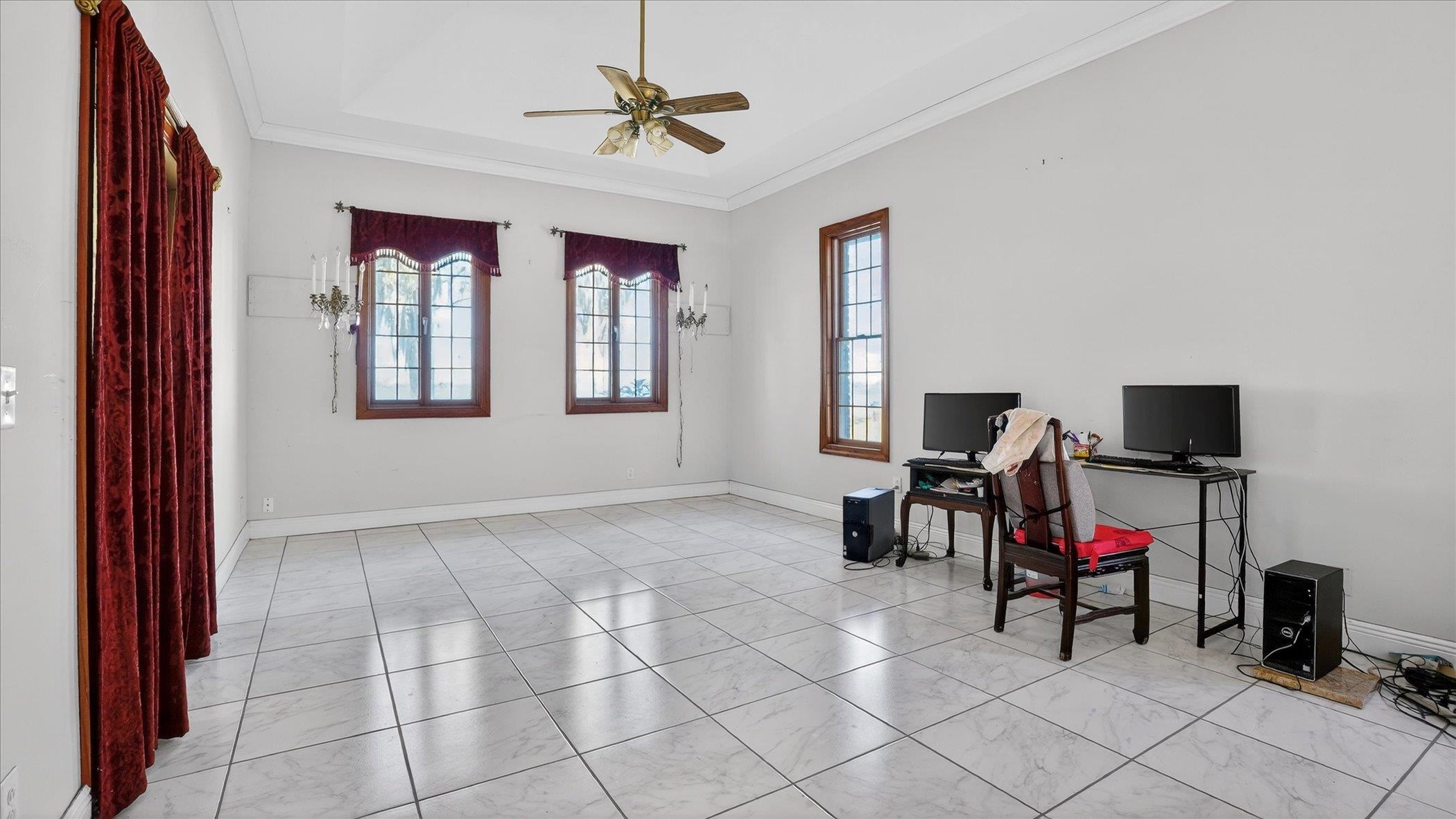 453 Federal Point Road East Palatka, FL 32131 - Photo 39 of 68 a living room with furniture and a flat screen tv