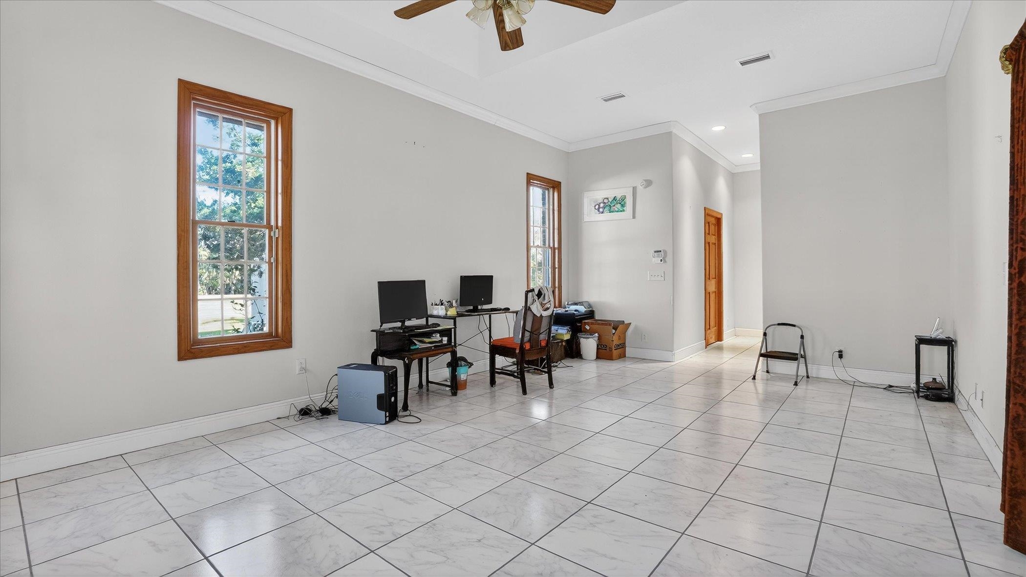 453 Federal Point Road East Palatka, FL 32131 - Photo 42 of 68 a living room with furniture and a window