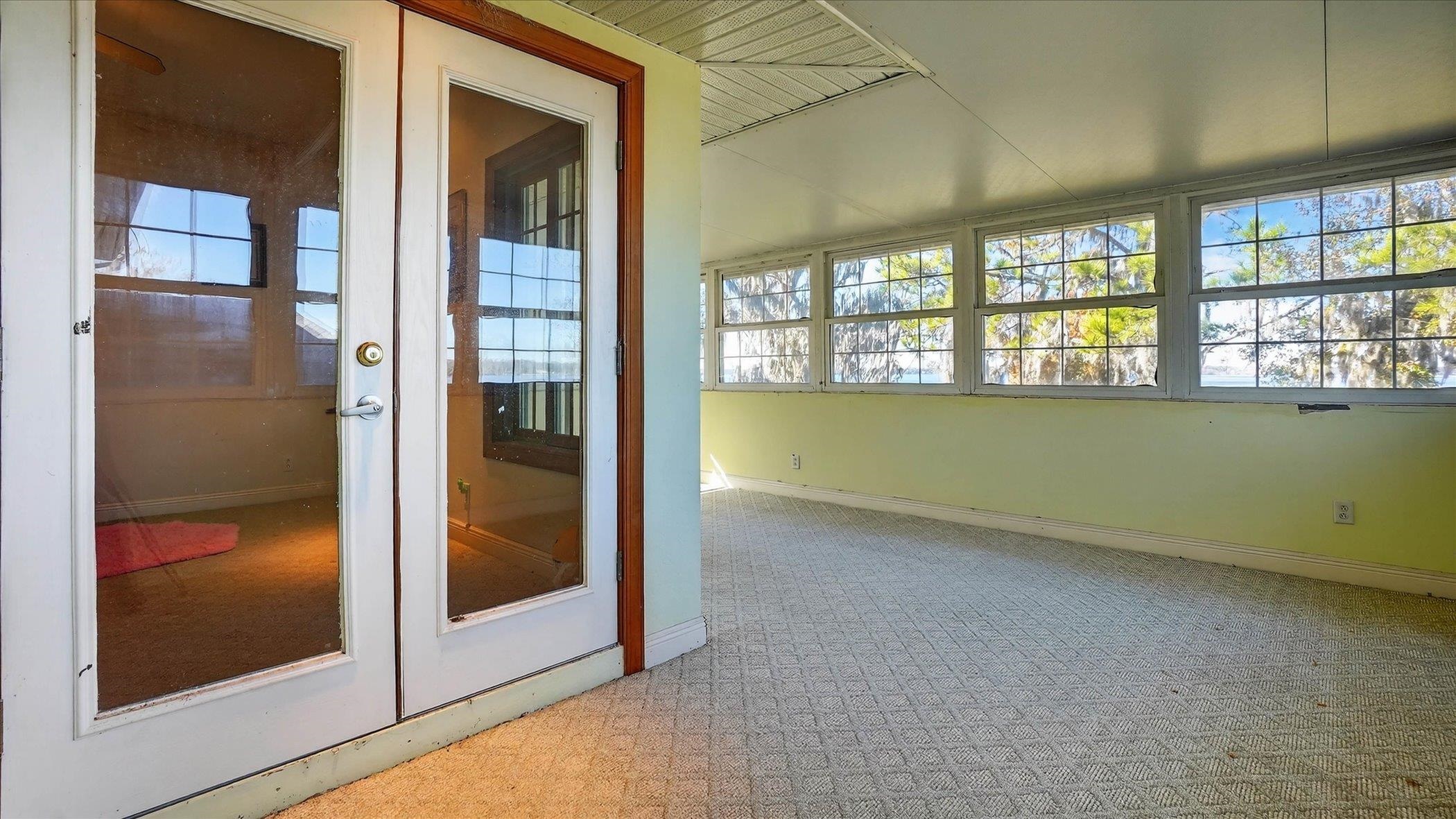 453 Federal Point Road East Palatka, FL 32131 - Photo 43 of 68 View of unfurnished sunroom