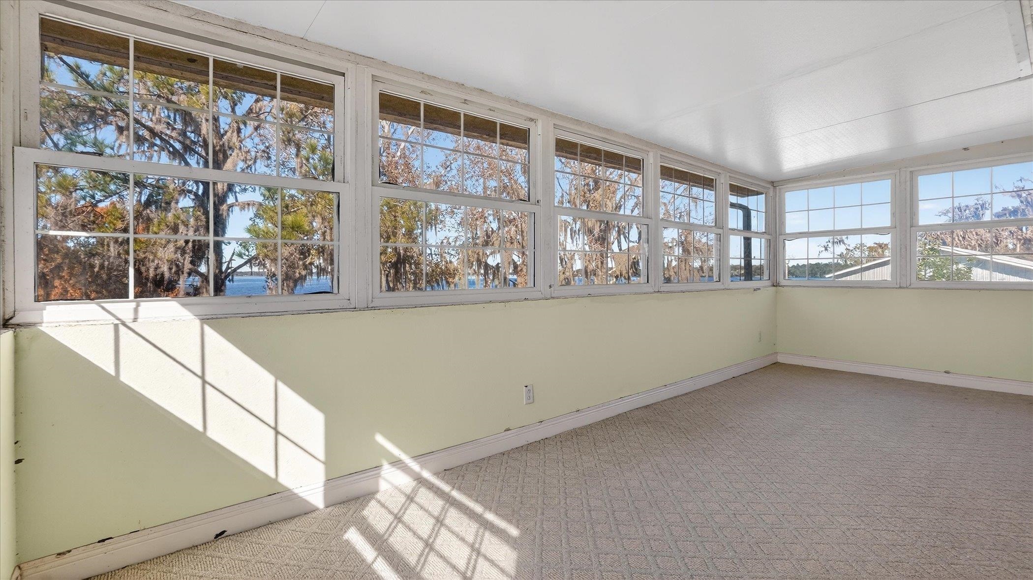 453 Federal Point Road East Palatka, FL 32131 - Photo 45 of 68 a view of a large room with a large window