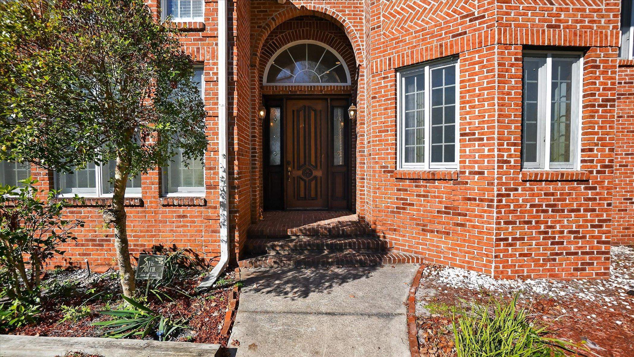 453 Federal Point Road East Palatka, FL 32131 - Photo 5 of 68 Doorway to property featuring brick siding