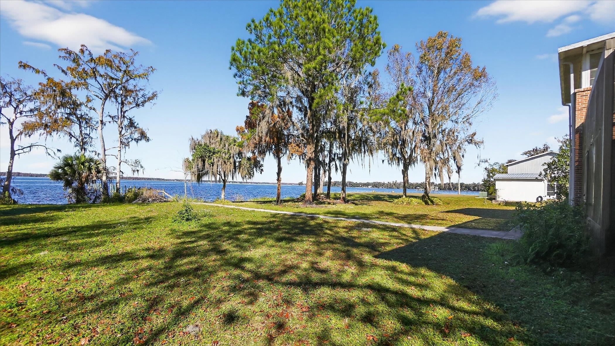 453 Federal Point Road East Palatka, FL 32131 - Photo 56 of 68 View of grassy yard with a water view