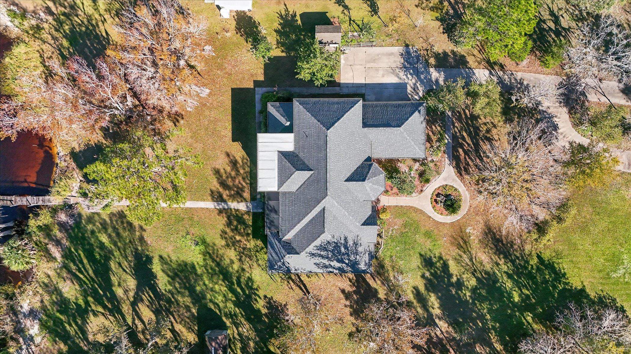453 Federal Point Road East Palatka, FL 32131 - Photo 60 of 68 an aerial view of a house with yard swimming pool and outdoor seating