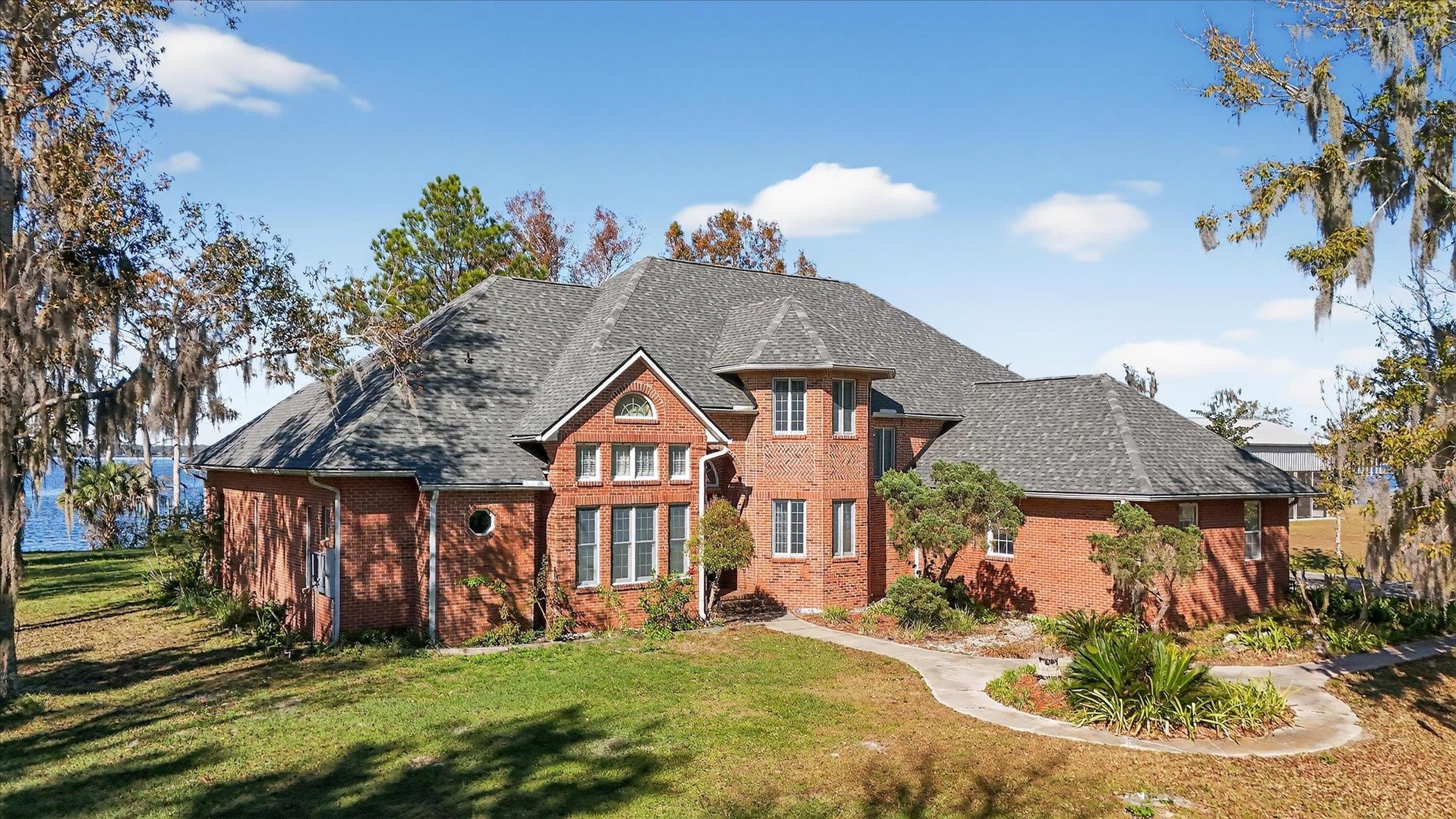 453 Federal Point Road East Palatka, FL 32131 - Photo 66 of 68 a front view of a house with a yard