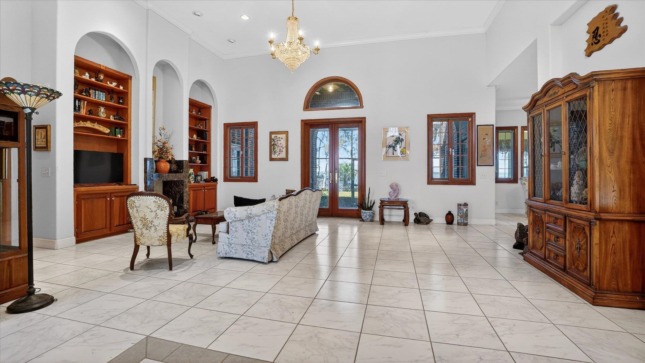 453 Federal Point Road East Palatka, FL 32131 - Photo 8 of 68 a view of living room filled with furniture and wooden floor