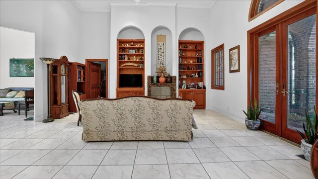 a kitchen with stainless steel appliances granite countertop a refrigerator stove and sink