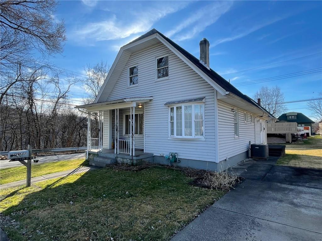 405 Routh Street Monroeville, PA 15146 - Photo 1 of 18 a view of a house with backyard and swimming pool
