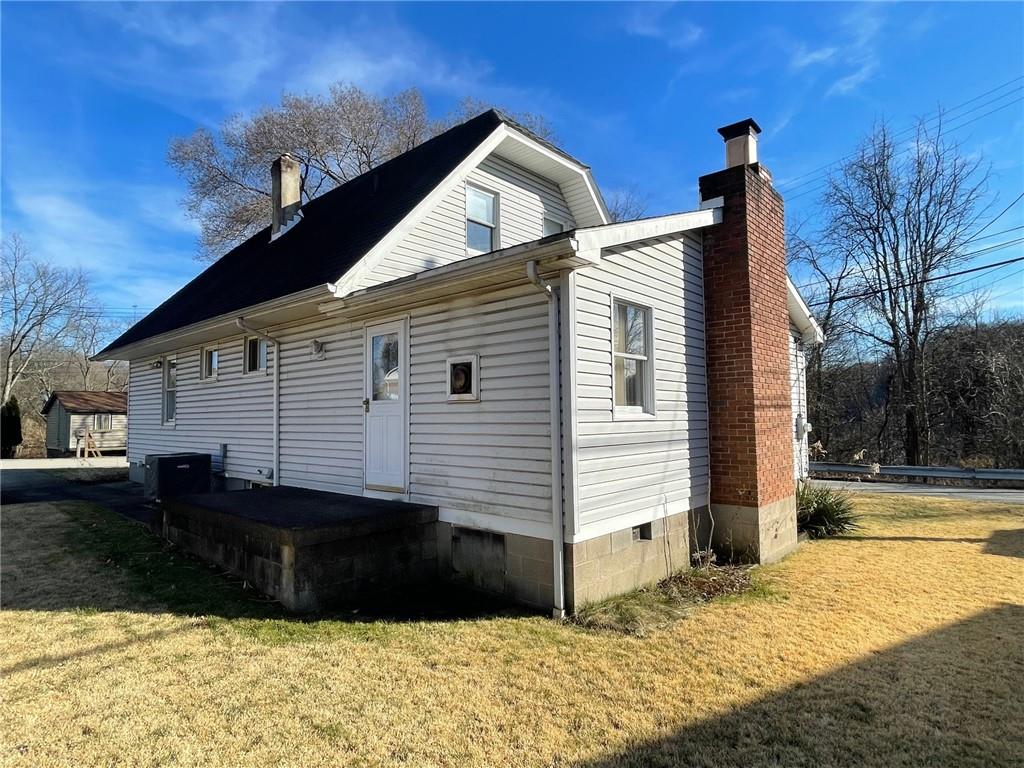 405 Routh Street Monroeville, PA 15146 - Photo 17 of 18 a view of a house with a yard